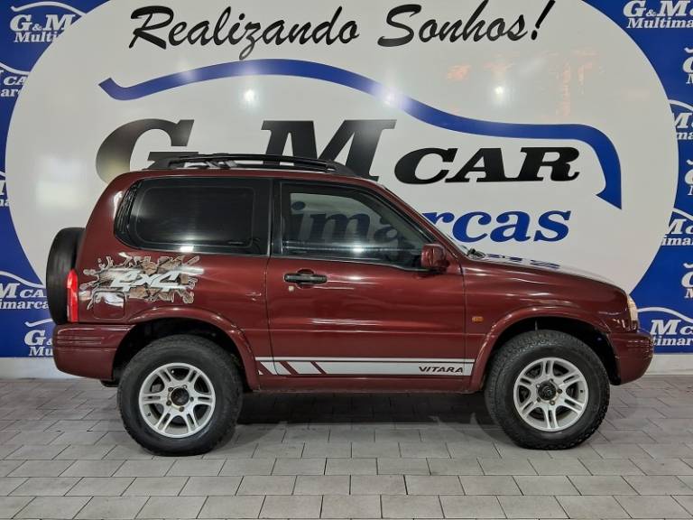 SUZUKI - GRAND VITARA - 1998/1999 - Vermelha - R$ 37.900,00