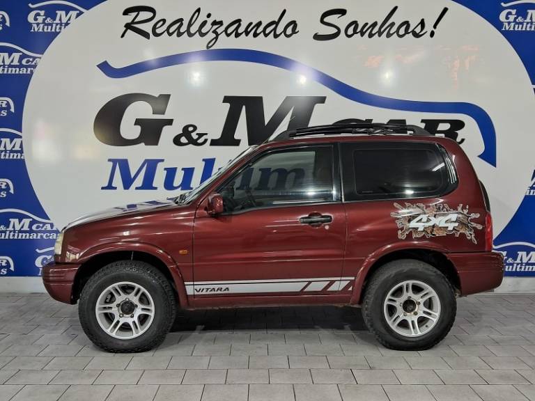 SUZUKI - GRAND VITARA - 1998/1999 - Vermelha - R$ 37.900,00